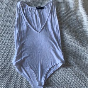 White plunge body suit